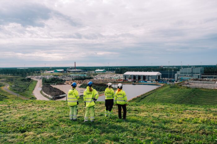 four Syklo's workers at waste sorting plant in Rusko, Oulu.