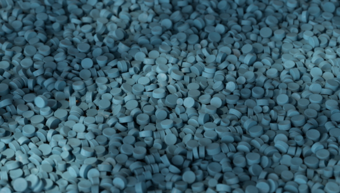 Blue plastic granulate.